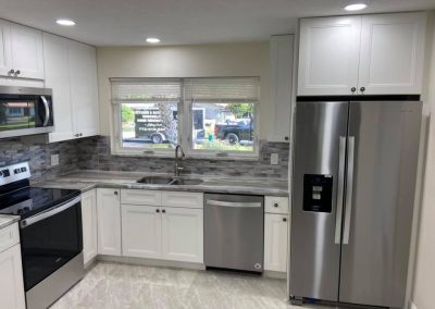 kitchen remodel with white cabinets stainless steel applicances